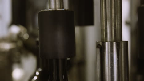 Wine-bottles-on-conveyor-belt-in-wine-factory