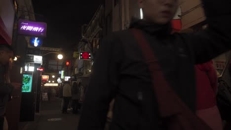 Locals-Walking-Through-Golden-Gai-Street-In-At-Night