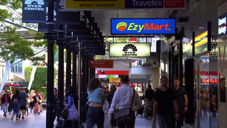 Busy-street-views-of-Queen-street-mall-crowded-with-people,-Myer-Brisbane-closing-down-sale,-closure-of-flagship-store-located-at-namesake-shopping-centre-at-the-central-business-district