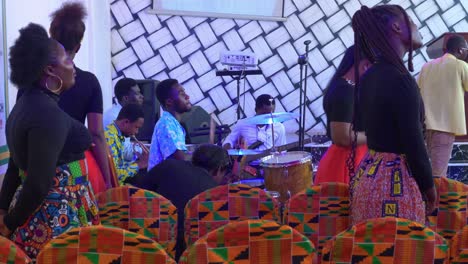 African-people-in-rustic-church-orchestra-playing-instruments-and-singing