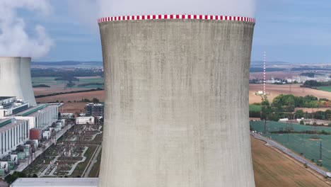 Aerial-descend-near-of-Dukovany-nuclear-power-plant-cooling-tower-wall