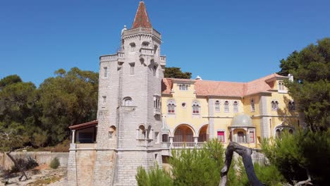 Condes-de-Castro-Guimarães-Museum,-gothic-revival-castle-from-side-view-in-Cascais,-Portugal