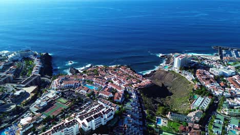 View-of-ocean-from-drone-in-resort-town-Tenerife-Costa-Adeje-Spain