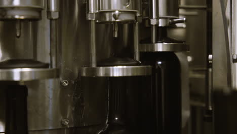 Wine-bottle-undergoing-de-ox-process-with-nitrogren-in-bottling-facility