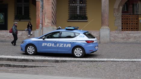 Seat-Leon-3rd-generation-vehicle-of-Italian-police-called-Polizia-in-the-streets-of-Bologna,-Italy