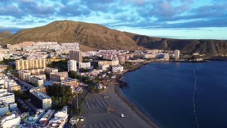 Los-Cristianos,-Tenerife-Costa-Adeje-Aerial,-Playa-De-Las-Vistas-Volcanic-Sand-Beach
