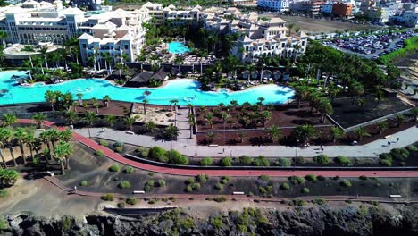 Deluxe-hotel-in-Tenerife,-Costa-Adeje,-Barcelo-Santiago-in-Canary-Islands,-Spain-drop-down-view