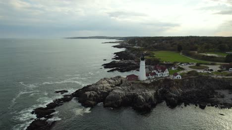 Portland-Head-Light-Lighthouse-on-Beautiful-Maine-Atlantic-Ocean-Coastline,-Aerial