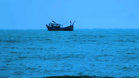 Traditional-Fishing-Boat-Anchored-Near-The-Beach-In-The-Early-Morning