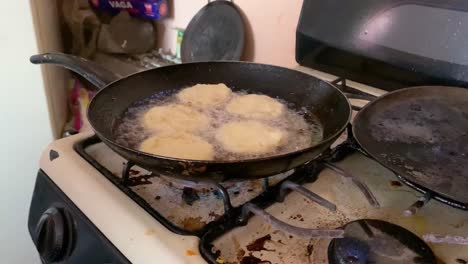 Potato-pancakes-cooking-in-oil-over-low-heat-Mexican-food