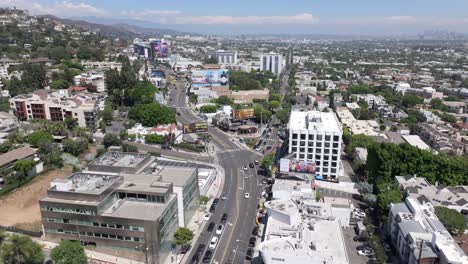 Aerial-of-the-Iconic-Sunset-Boulevard-in-Las-Vegas-on-a-bright-sunny-day,-drone-shot