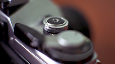 Close-up-Shot-of-Old-Film-SLR-Camera-Shutter-and-Winding-Know
