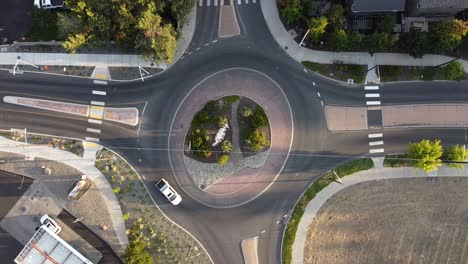 Roundabout-in-a-small-town-with-cars-driving-around-it