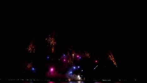 Colorful-pyrotechnic-display-during-the-Pattaya-International-Fireworks-Festival-2023,-at-Chonburi-province-in-Thailand