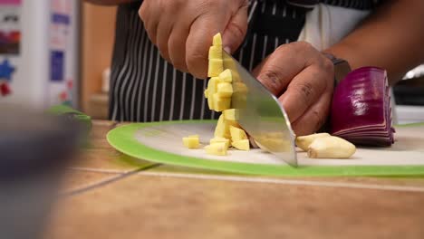 Chopping-ginger-root-and-garlic-cloves---Chana-Masala-series