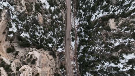Aerial-View-Of-Cedar-Canyon-Through-State-Route-14-In-Southern-Utah,-USA