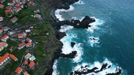 drone-video-of-a-village-next-to-the-ocean