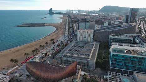 Aerial-view-of-Somorrostro-Beach-and-Olympic-fish,-coast-of-Barcelona