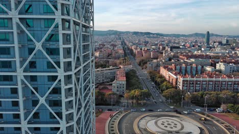 Hotel-Arts-Foreground,-Plaza-De-Los-Voluntarios-Olímpicos-And-Skyline,-Barcelona