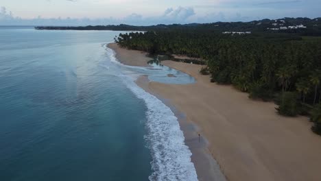 Aerial-view-of-picturesque-Playa-Cosón-beach-near-Las-Terrenas-on-the-Samaná-peninsula-in-the-Dominican-Republic