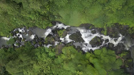 Top-down-bird-eye-shot-of-Sikulikap-Waterfall-and-river-stream
