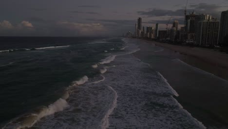 Gold-Coast,-Surfers-Paradise,-Queensland,-Australia,-drone,-moody-skies,-night-falls-in-a-colourful-landscape