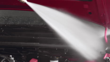 Car-Wash:-Spraying-Water-Jet-Inside-Car-Hood-Engine