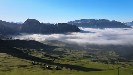 Sunrise-from-above-clouds-shot-on-a-drone-in-the-Italian-Alps,-Dolomites