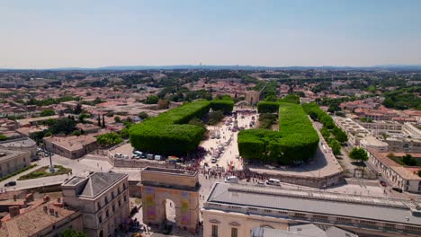Rotating-aerial-view-over-crowded-Peyrou-gardens-with-gaypride-start-of-the-march-demonstation