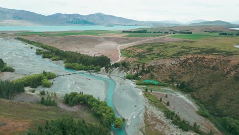 Cass-River-New-Zealand-bridge-with-Lake-Tekapo-in-the-background-with-mountians