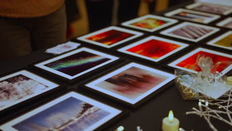 A-row-of-colorful-framed-artistic-abstract-photos-during-exhibition-closeup