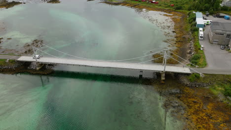 Aerial-View-Of-A-Bridge-Near-Oppeide-Village-In-Nordland-County,-Norway