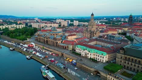 Panoramic-aerial-view-of-Dresden,-a-capital-city-in-Germany,-featuring-the-downtown-city-center,-river,-and-historical-buildings