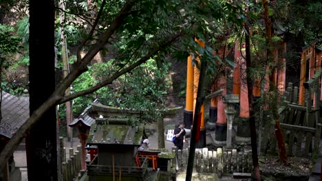 The-religious-Shinto-shrine-entrance-stairs-in-Fushimi-Inari-Taisha