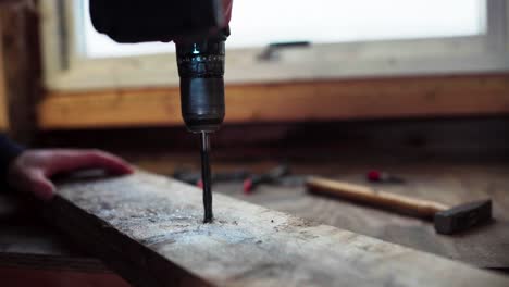 Power-Drill-Drilling-Hole-On-Wood---Carpentry-Concept