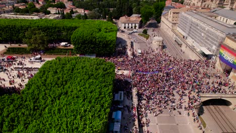 Aerial-view-of-people-walking-in-the-city-of-Montpellier,-south-of-France,-during-the-gay-pride-celebration