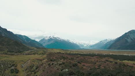 Mt-Cook-New-Zealand-drone-over-looking-the-base-of-the-mountian-UHD