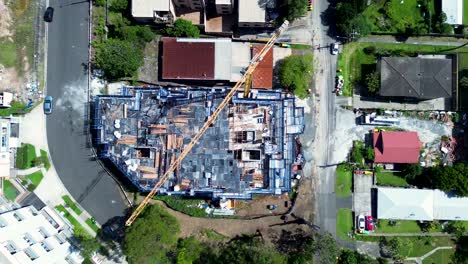 Drone-aerial-landscape-construction-development-building-site-with-cranes-residential-street-infrastructure-industry-worksite-Gosford-Central-Coast-Australia