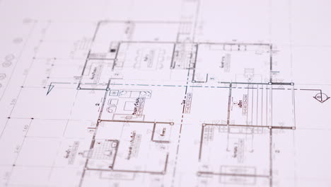 Architect's-workspace-with-building-plans-and-blueprints