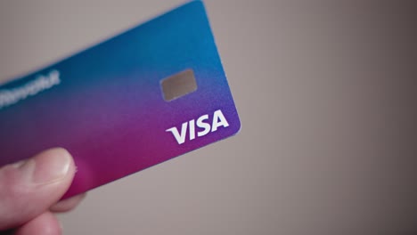 Hand-holding-a-Revolut-credit-card
