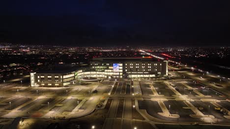Primary-Children's-Hospital-in-Lehi,-Utah---ascending-aerial-nighttime-reveal