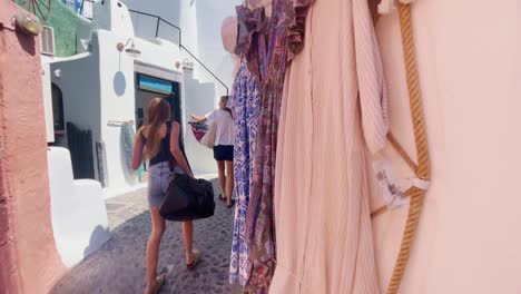 Oia-Santorini-Greece-Island-Travel-Tourist-Immersive-Walk,-Europe,-4K-|-Greek,-Aegean,-Sea,-Cliffside,-Ocean,-City,-Vacation,-Shopping,-White,-Marble,-Crowd,-Flowers,-Traveler,-People,-Stairs,-Luggage