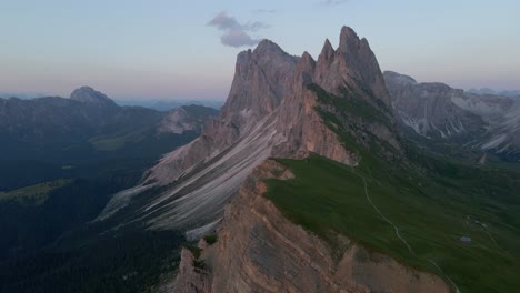 Seceda-aerials-filmed-with-a-drone-during-sunrise-in-the-Italian-alps,-Dolomites
