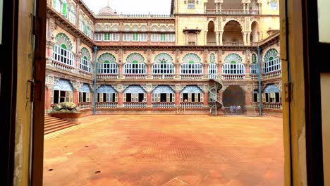 Beautiful-courtyard-inside-of-the-Mysore-Palace,-the-official-residence-of-the-Wadiyar-dynasty-and-the-seat-of-king-of-Mysore