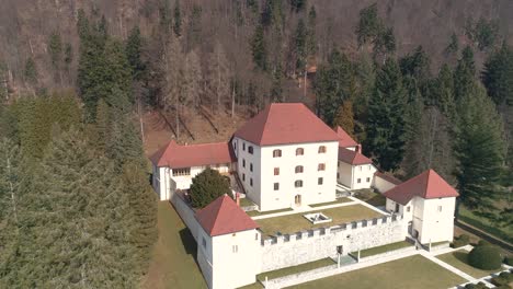 Forward-flying-drone-view-of-castle-Strmol,-Slovenia