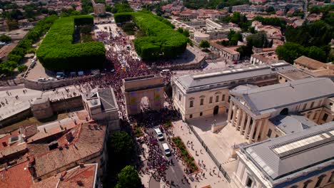 Aerial-view-of-the-Arc-de-Triomphe-or-triumphal-arch-in-the-city-of-Montpellier-in-France,-during-the-Gaypride