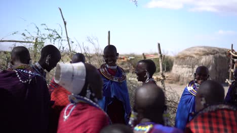 Happy-Maasai-Tribe-Female-After-Traditional-Jumping-Dance,-Slow-Motion