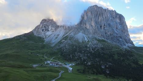 Huge-mountain-filmed-with-a-drone-during-sunset-in-the-italian-alps,-Dolomites