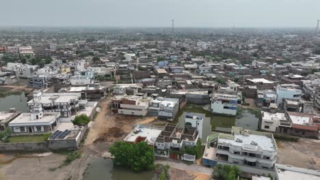 Drone-descended-and-tilting-up-to-show-the-beautiful-city-of-Badin-in-Pakistan-with-clear-skies