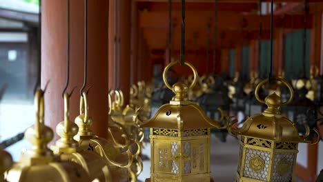 Rows-Of-Hanging-Gold-Japanese-Lanterns-at-Kasuga-taisha-Shrine